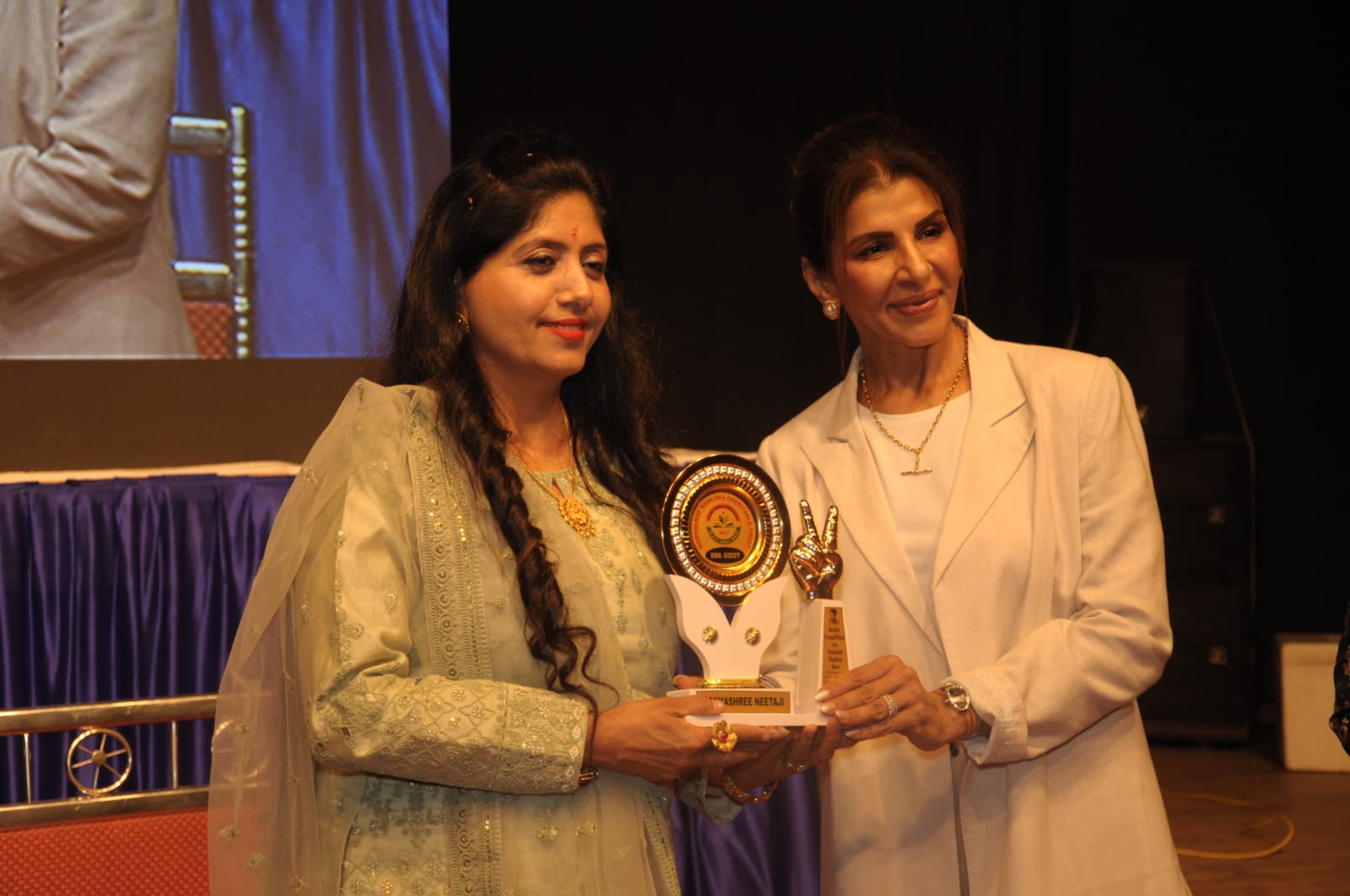 Sakhashree felicitated by veteran actress Anita Raj in a function in Ahemdabad, Gujrat.